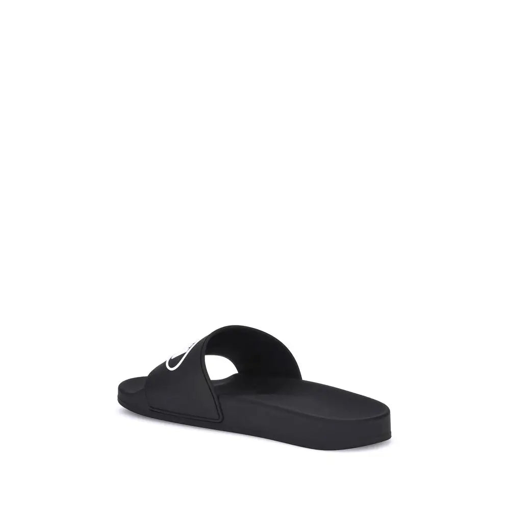 Balenciaga Flache Gummisandalen in Schwarz