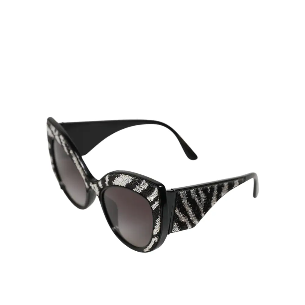Dolce & Gabbana Sonnenbrille mit Schmetterlingsrahmen Schwarz und Silber mit Pailletten