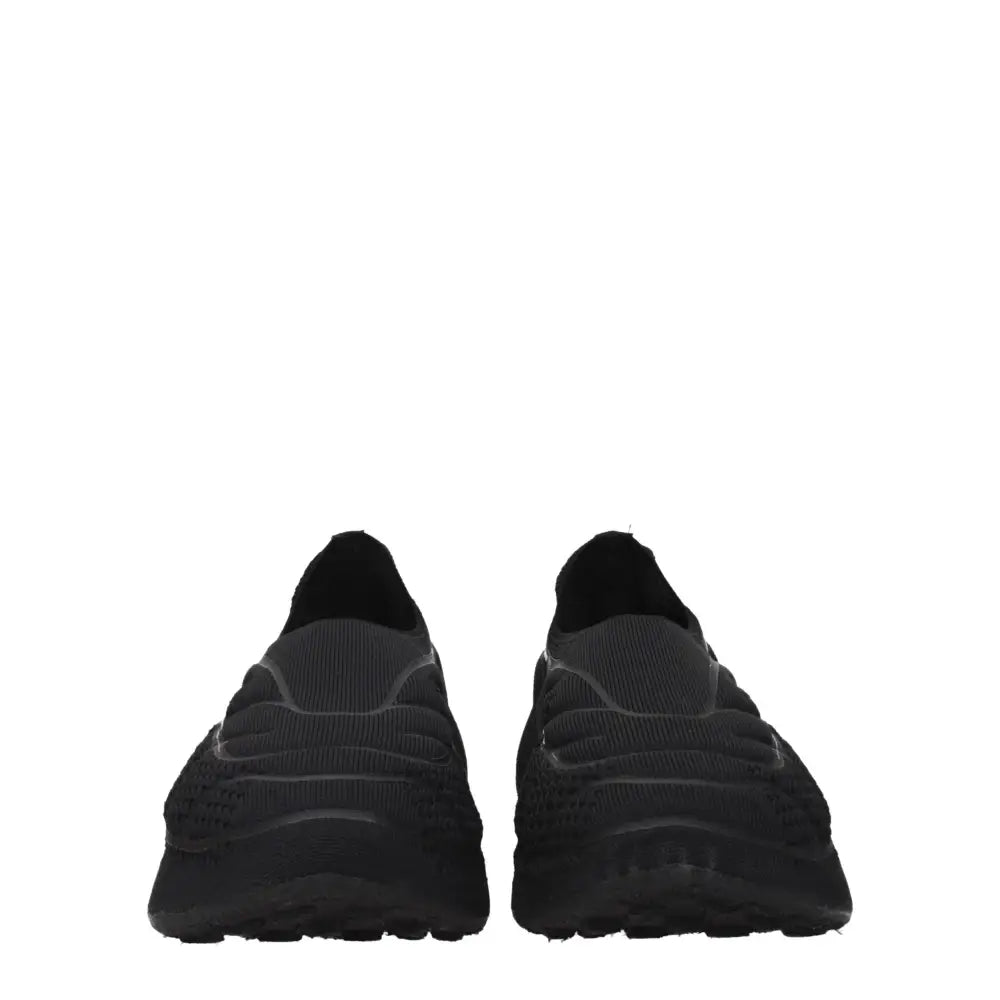 Givenchy Slipper aus schwarzem Stoff