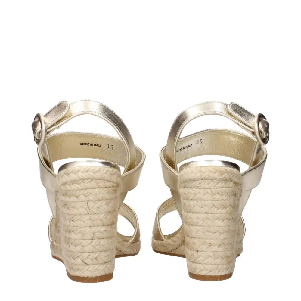 Prada Goldene Leder-Keilsandalen