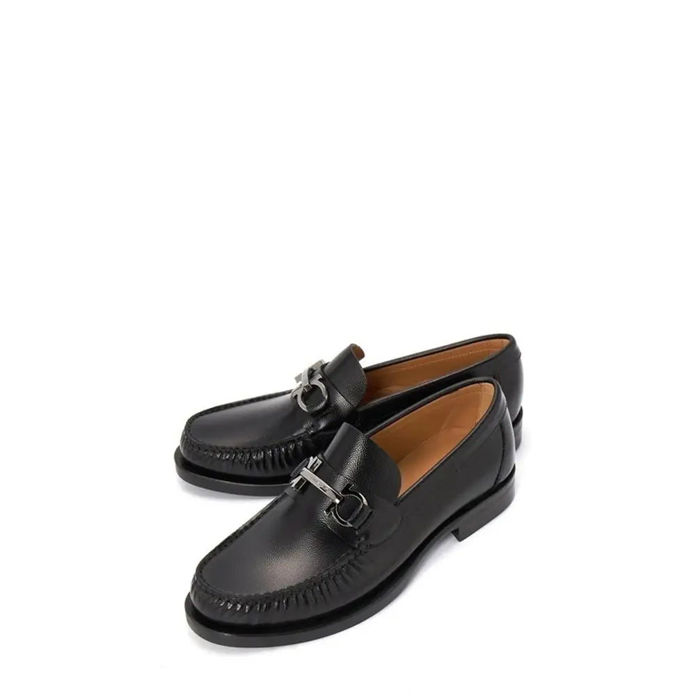 Salvatore Ferragamo Schwarze Kalbsleder-Slipper - EU41/US8