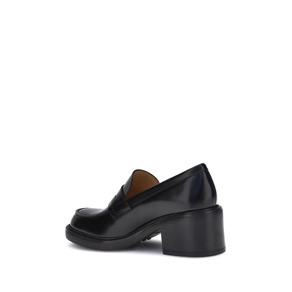 Tod’s Schwarze Kalbshaut Bos Taurus Plateau-Loafer