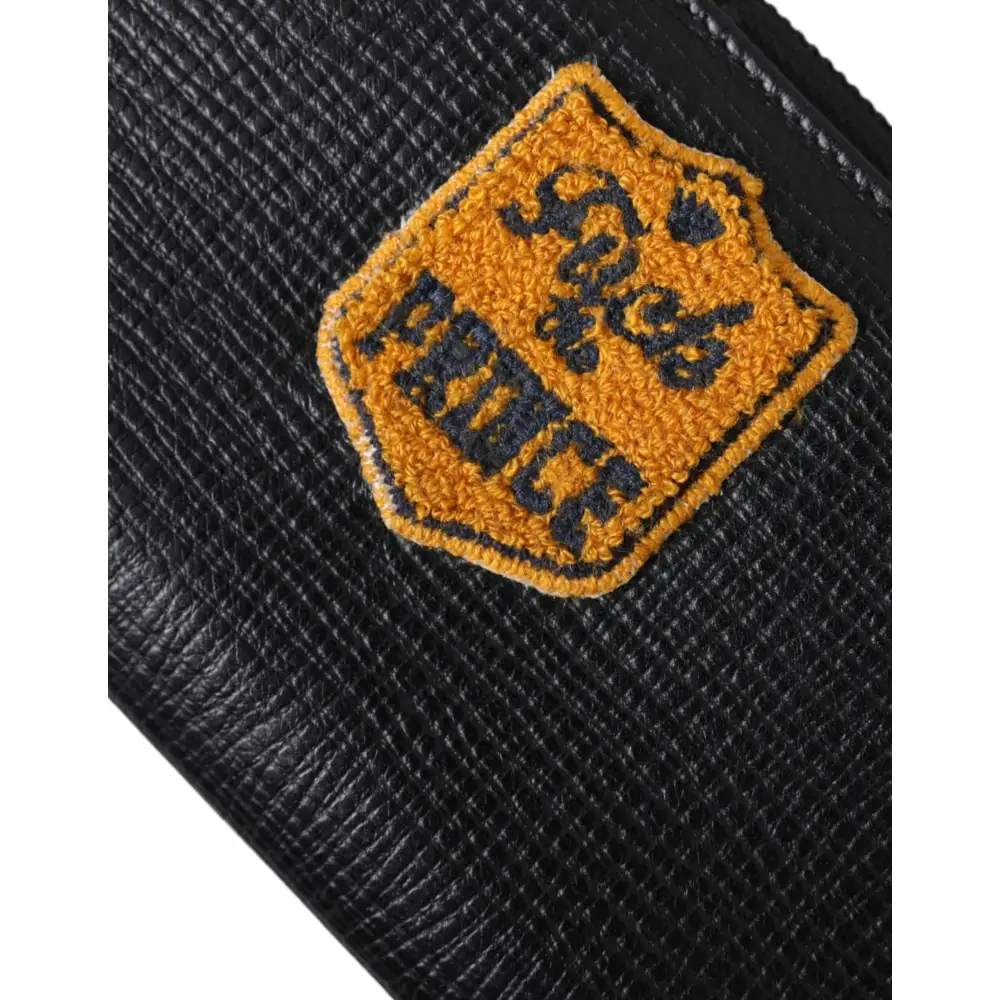 Dolce & Gabbana Schwarzes Leder Logo Patch Zip Around Continental Brieftasche