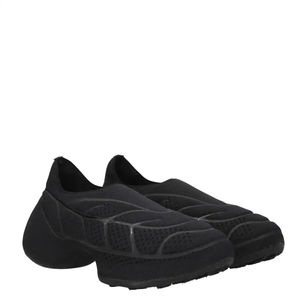 Givenchy Slipper aus schwarzem Stoff