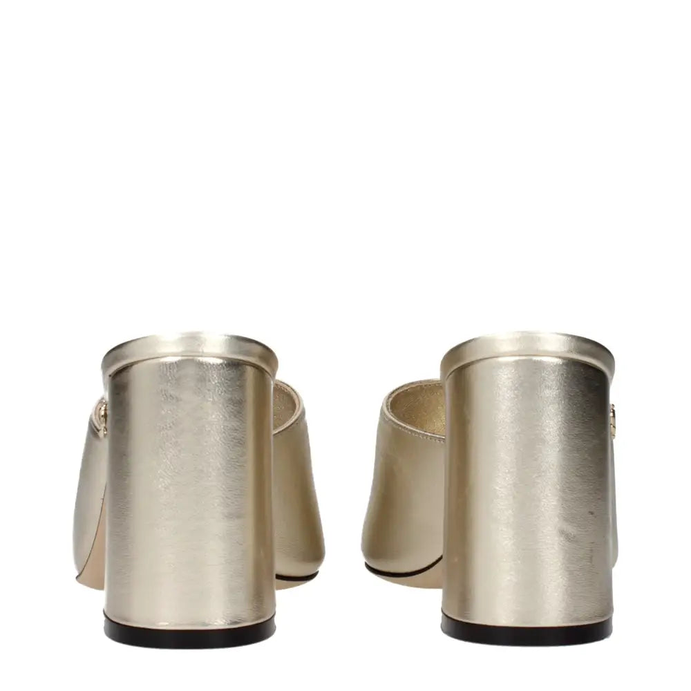 Jimmy Choo Goldene Ledersandalen mit Plateauabsatz