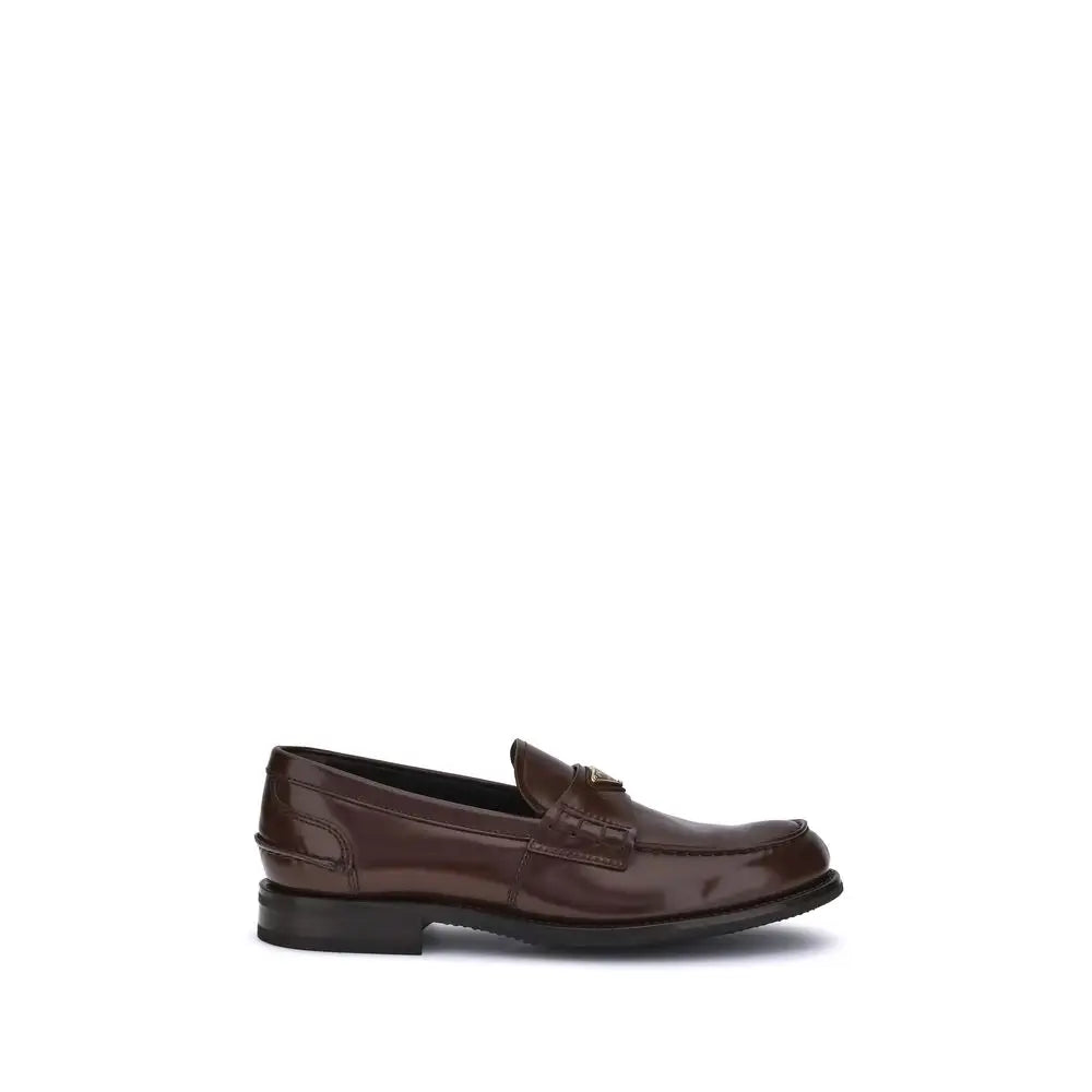 Prada Braune Kalbsleder Bos Taurus Slipper - EU39/US6