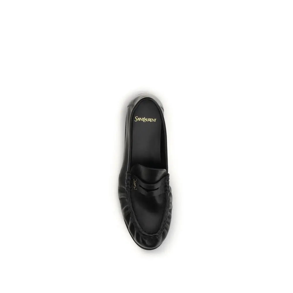 Saint Laurent Schwarze ’Bos Taurus’ Kalbsleder Loafer zum Hineinschlüpfen