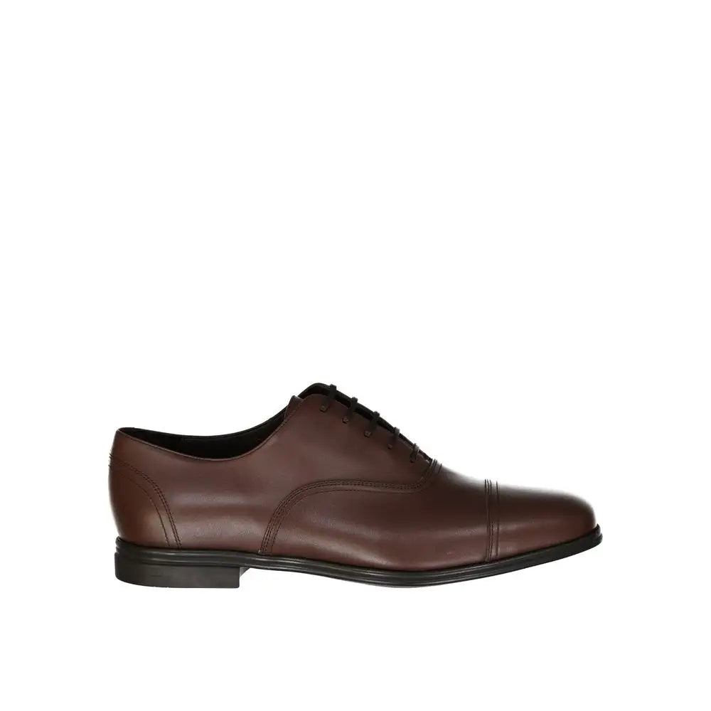 Salvatore Ferragamo Braune Leder Oxford- und Derby-Schuhe - EU43.5/US10.5