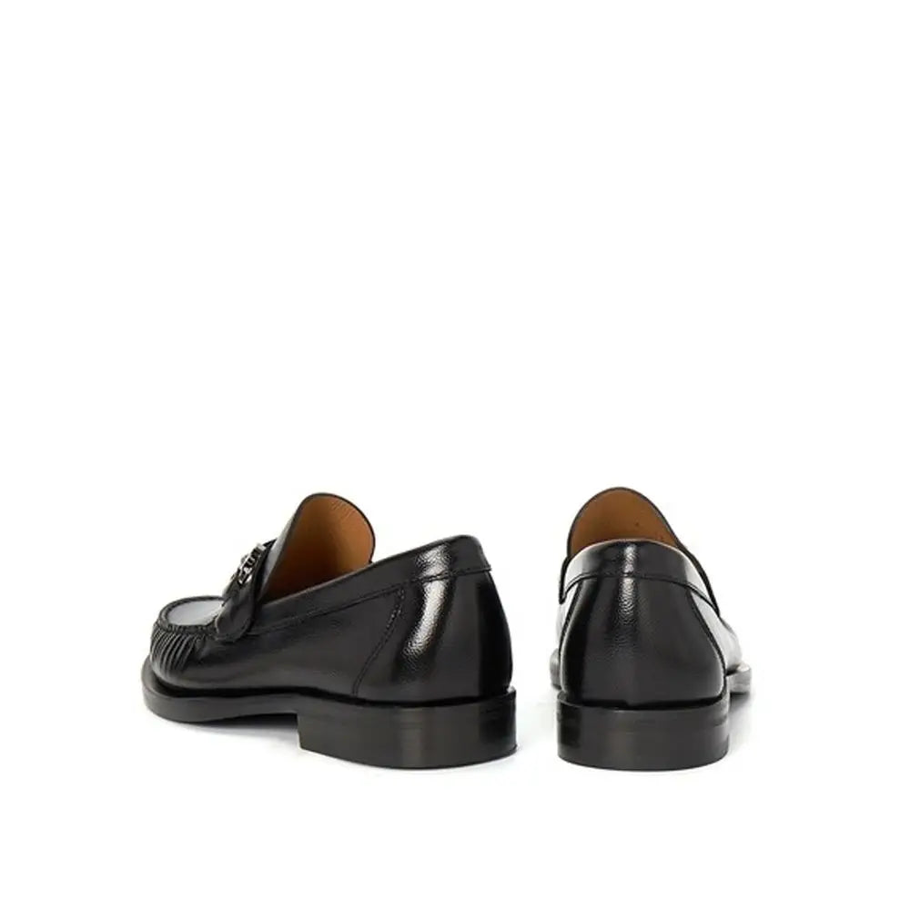 Salvatore Ferragamo Schwarze Kalbsleder-Slipper - EU41/US8