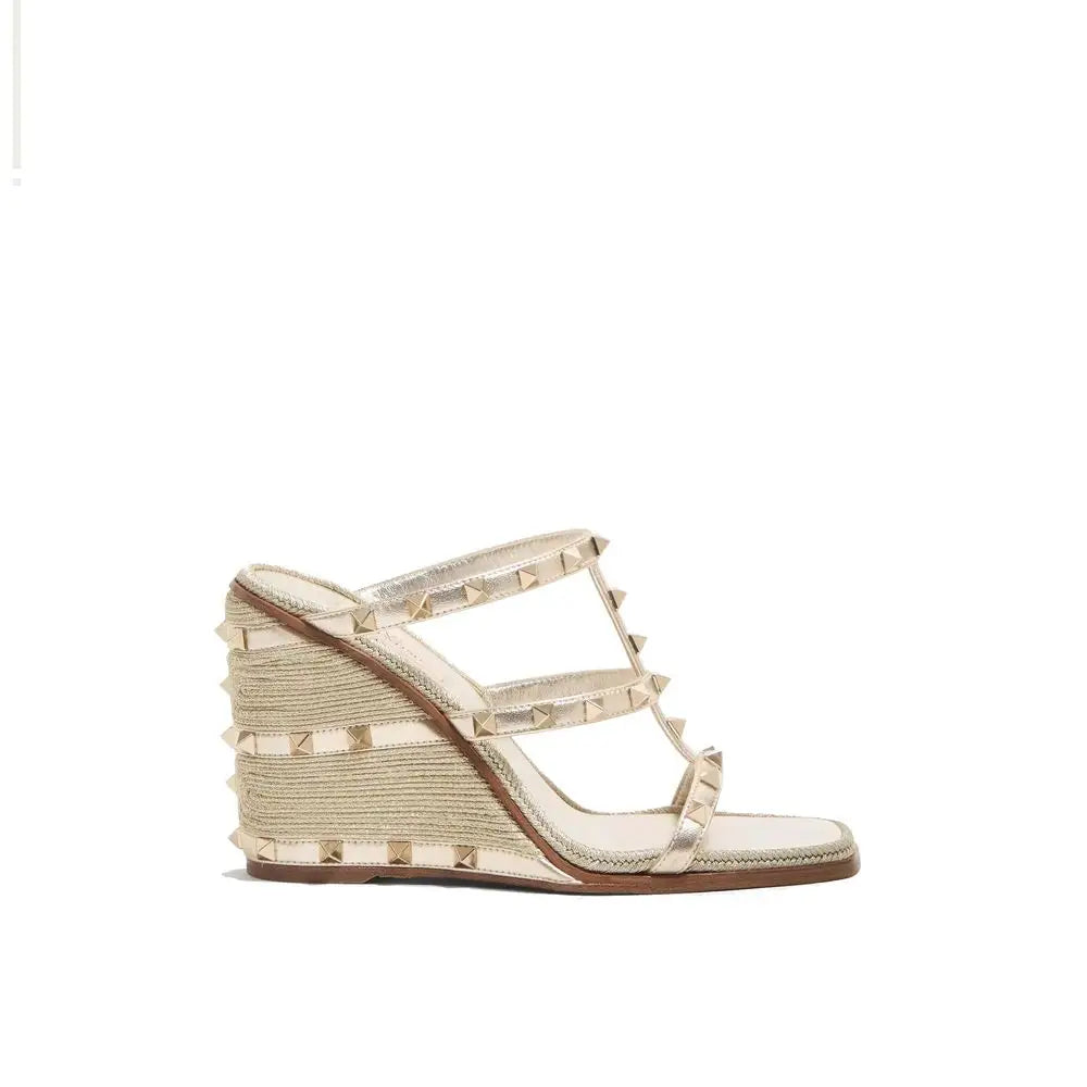 Valentino Garavani Mules aus Kalbsleder in Gold - EU37/US7