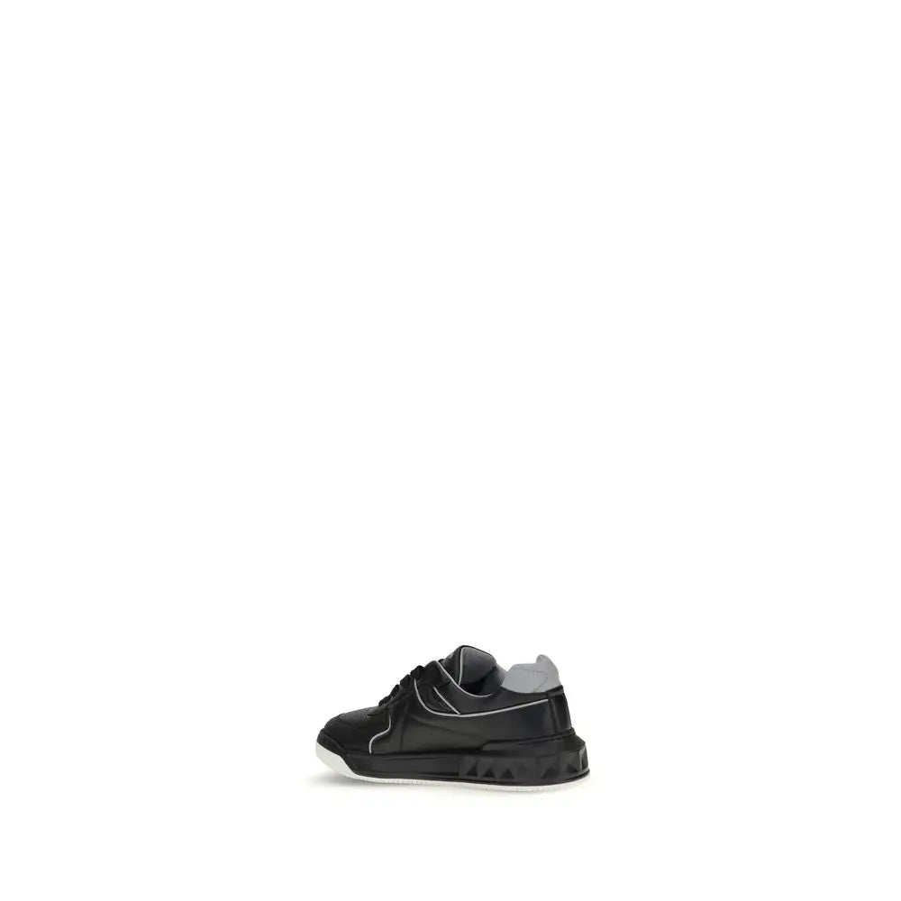 Valentino Garavani Schwarze Low-Top-Sneaker aus Kalbsleder Bos Taurus