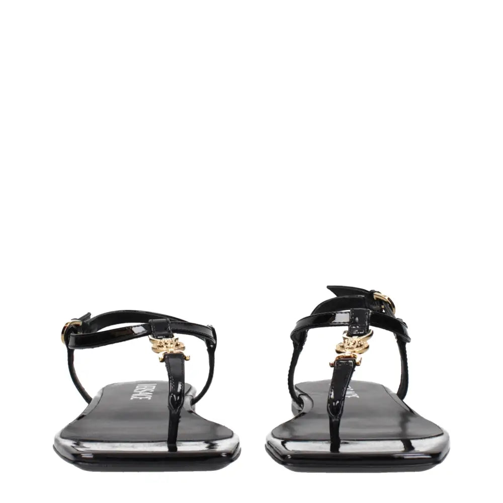Versace Schwarze Flip-Flop-Sandalen aus Leder - EU38/US8